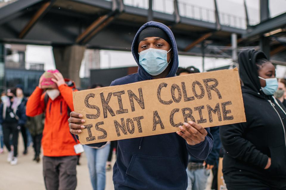 Students from Roosevelt High School participate in a statewide walkout April 19 in Minneapolis. Students gathered at the U.S. Bank Stadium to protest racial injustice and honor the lives of George Floyd and Daunte Wright.