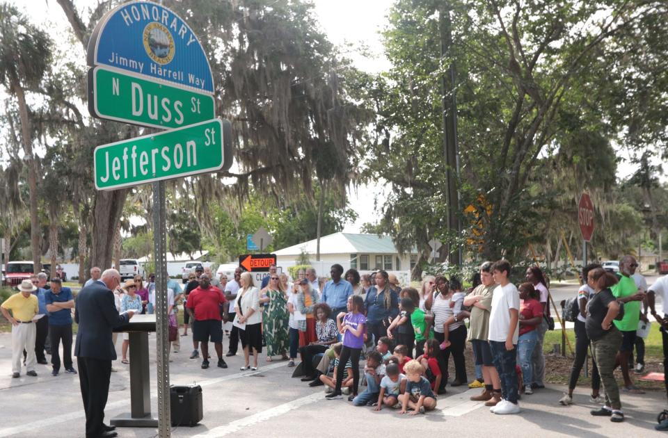 New Smyrna Beach Mayor Fred Cleveland speaks to the crowd following the unveiling of the new street sign renaming Duss Street as Honorary Jimmy Harrell Way, Thursday, April 27, 2023, during a ceremony outside the Mary S. Harrell Black Heritage Museum in New Smyrna Beach.