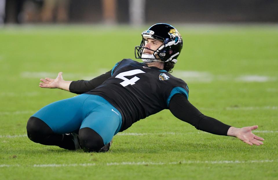 Former Jaguars' kicker Josh Lambo (4), seen here celebrating a 56-yard field at the halftime gun of a 38-20 win over the Indianapolis Colts in the final 2019 regular-season game, is willing to risk public scorn by filing a lawsuit against the Jaguars, alleging he suffered emotional distress and had his career sabotaged over ex-head coach Urban Meyer kicking him before a 2021 preseason game.