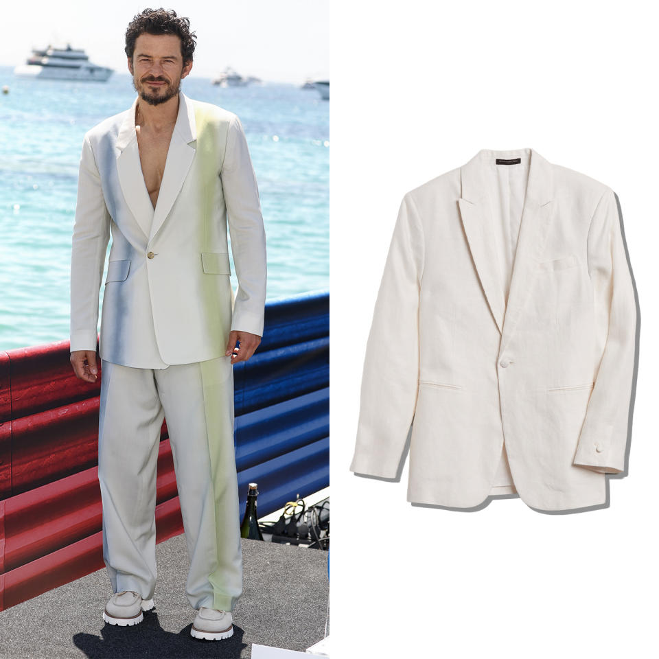 Orlando Bloom next to the suit that looks similar to the one he he was wearing at Cannes Film Festival