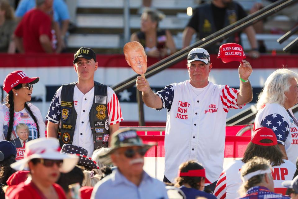 Trump supporters arrive before former President Donald Trump speaks at Ted Hendricks Stadium in Hialeah.