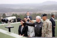 U.S. Vice President Mike Pence looks toward the north from an observation post inside the demilitarized zone separating the two Koreas, in Paju, South Korea, April 17, 2017. REUTERS/Kim Hong-Ji