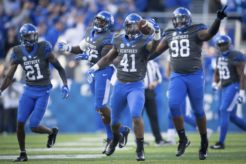 Kentucky linebacker Josh Allen (41) celebrate a turnover during the first half an NCAA college football game against Georgia in Lexington, Ky., Saturday, Nov. 3, 2018. (AP Photo/Bryan Woolston)