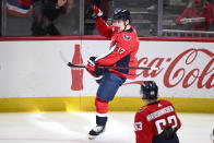 Washington Capitals center Dylan Strome (17) celebrates his goal during the third period of an NHL hockey game against the Detroit Red Wings, Tuesday, March 26, 2024, in Washington. The Capitals won 4-3 in overtime. (AP Photo/Nick Wass)