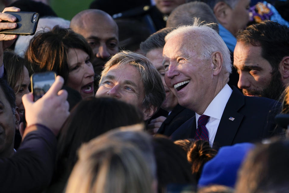 President Joe Biden poses for a photo after signing the $1.2 trillion infrastructure bill into law during a ceremony on the South Lawn of the White House in Washington, Monday, Nov. 15, 2021. (AP Photo/Susan Walsh)