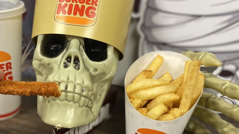 skeleton with chicken fries and fries
