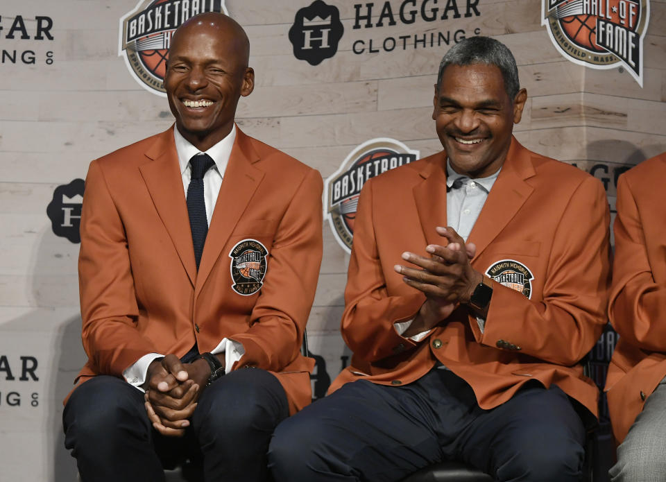 Basketball Hall of Fame inductees Ray Allen, left, and Maurice Cheeks laugh as they sit together during a news conference at the Naismith Memorial Basketball Hall of Fame, Thursday, Sept. 6, 2018, in Springfield, Mass. (AP Photo/Jessica Hill)