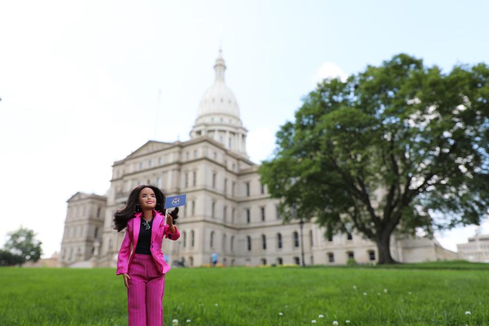 A Barbie version of Gov. Gretchen Whitmer making the rounds around the Capitol like here in front of the Capitol building.