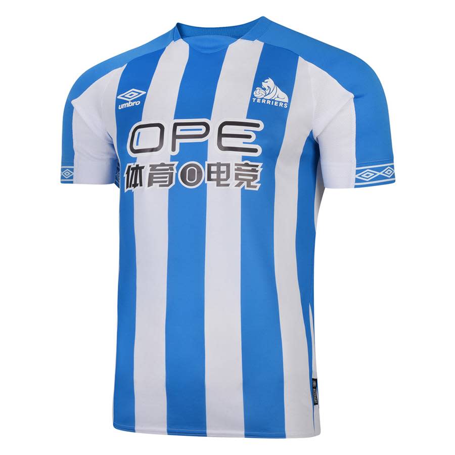 <p>Huddersfield’s pale blue and white stripes continue. </p>