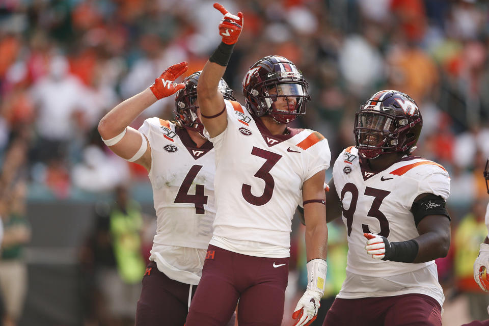 Caleb Farley points in celebration during a game.