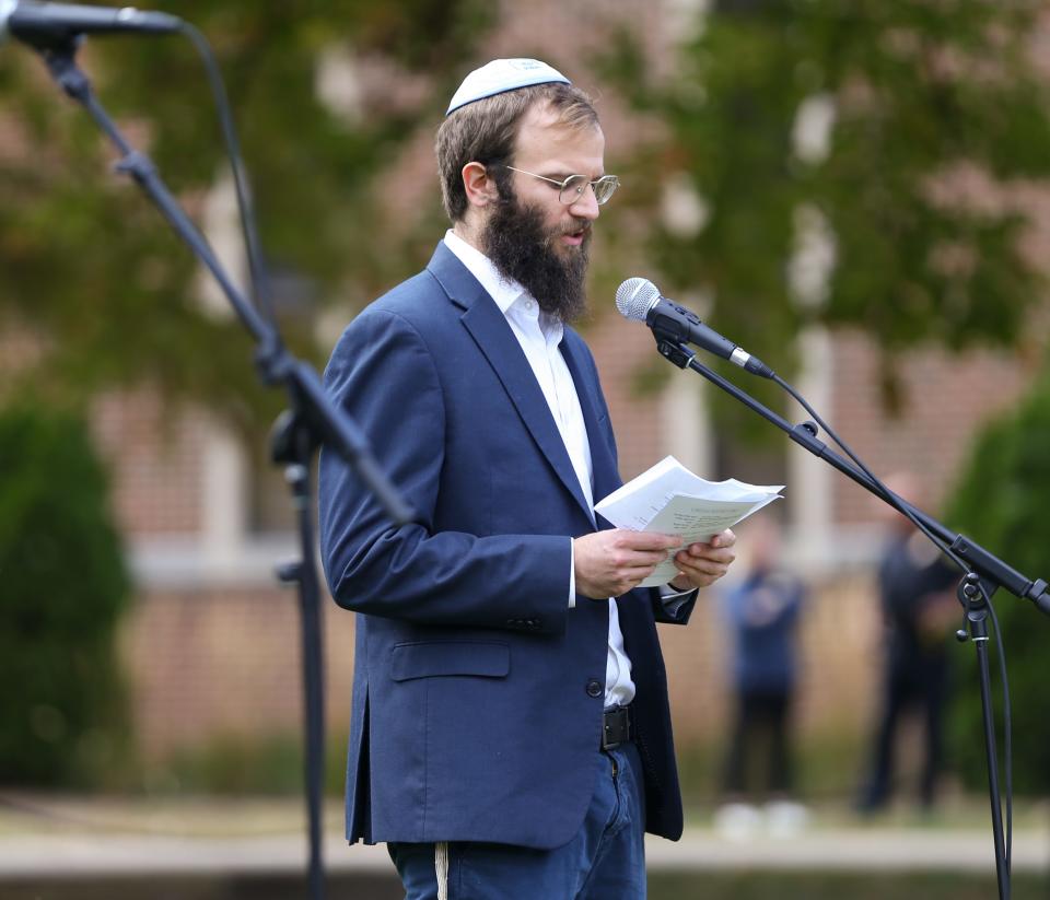 Rabbi Avremel Gluck of Chabad at Purdue University speaks to students who have gathered at the Israel vigil held in front of the university’s Engineering Mall, on Wednesday, October 11, 2023, in West Lafayette, Ind.