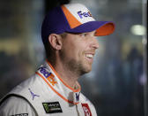 Denny Hamlin waits in the garage for a NASCAR Cup Series auto race practice to begin on Friday, Nov. 15, 2019, at Homestead-Miami Speedway in Homestead, Fla. Hamlin is one of four drivers racing for the series championship. (AP Photo/Terry Renna)