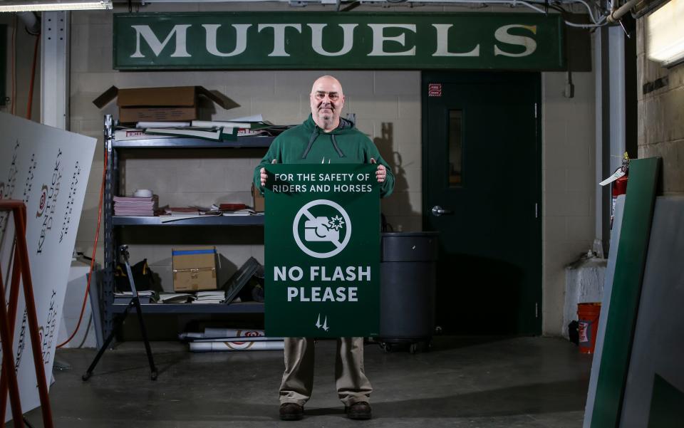 If you've seen those iconic green signs with white lettering (not to mention but we will anyway) the names of the winning Derby horse in the Paddock as well the sign between the twin spires -- that's the work of Todd Herl, sign maker at Churchill Downs. He's a one-man, sign-making sign shop that helps you know where to go, from the Jockey's Club to the Infield, as well as not using flash when taking pictures of the thoroughbreds.  April 14, 2022