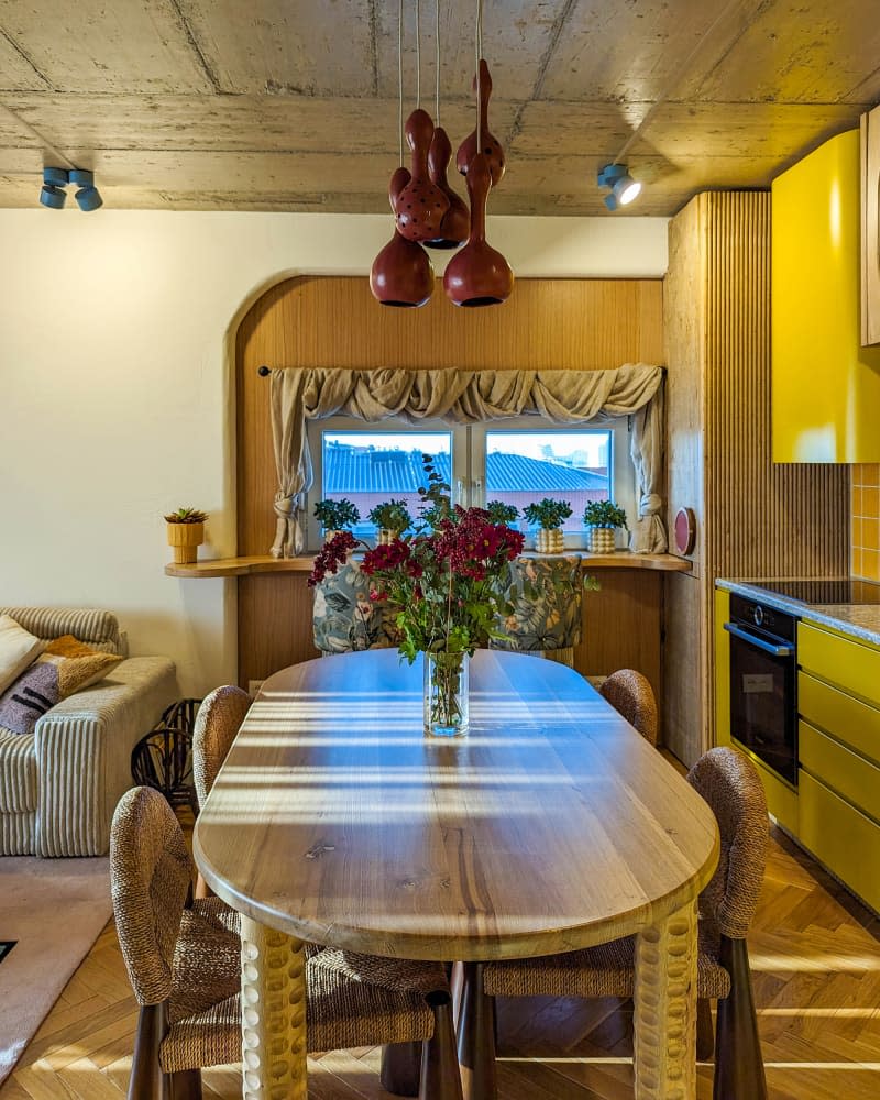 Dining room/kitchen with lots of yellow and wood