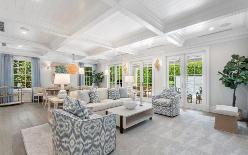 A coffered ceiling crowns the main living area of a Palm Beach house at 449 Brazilian Ave., which recently underwent a price reduction to $18.5 million.