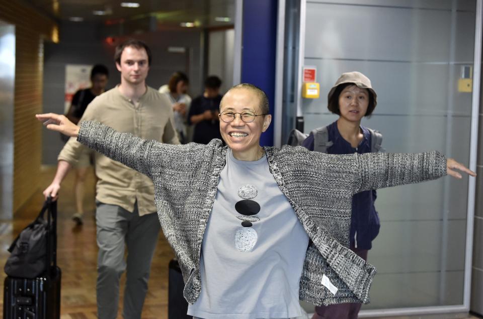 Liu Xia, the widow of Chinese Nobel dissident Liu Xiaobo, smiles as she arrives at the Helsinki International Airport in Vantaa, Finland, on July 10, 2018.