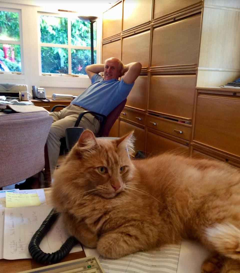 Simon relaxing in the home office with Softie, our cat, in 2015