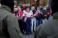 FILE PHOTO: Belarusian opposition supporters protest against presidential election results in Minsk