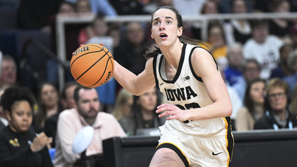 Iowa guard Caitlin Clark (22) drives to the basket against the LSU during the second half of an Elite Eight round college basketball game during the NCAA Tournament, Monday, April 1, 2024, in Albany, N.Y. (AP Photo/Hans Pennink)