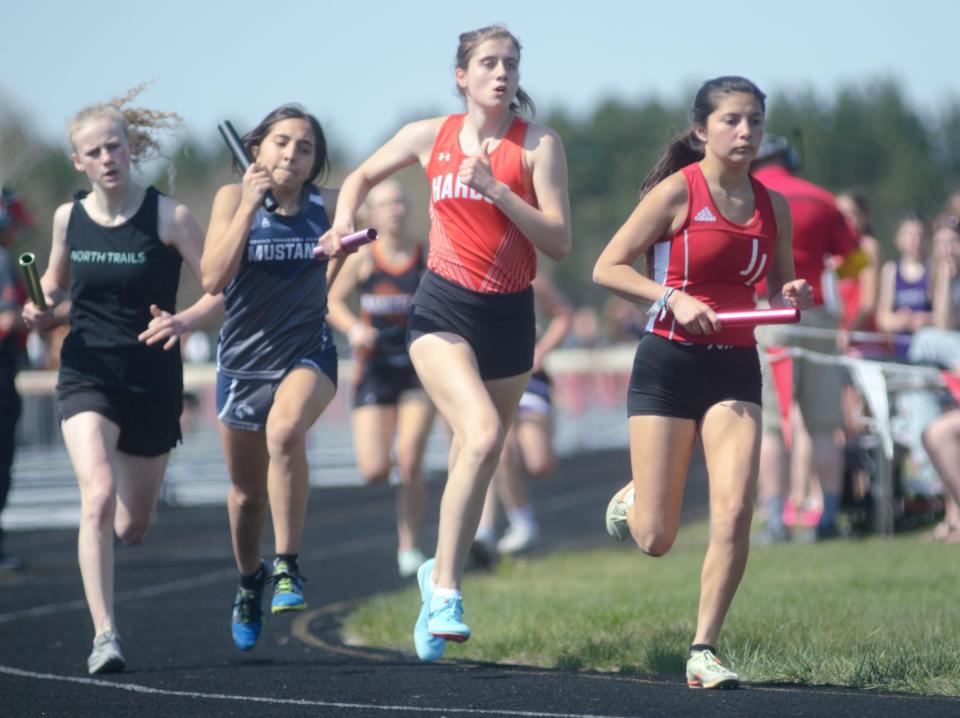 Yolanda Gascho (right) leads a group of 4x800 meter relay competitors during the Johannesburg-Lewiston Invite on Tuesday, May 9.