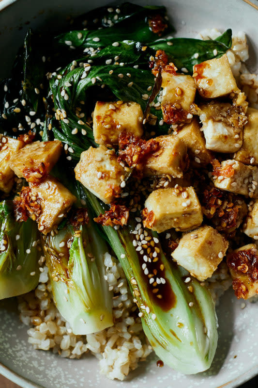 <p>This recipe is the perfect excuse to pick up those beautiful looking bok choy and make them the star of your dinner. Keep this vegan by omitting or replacing the honey.</p><p><strong>Get the recipe: <a href="https://naturallyella.com/crispy-tofu-bowls/" rel="nofollow noopener" target="_blank" data-ylk="slk:Crispy Tofu Bowls with Sesame Bok Choy;elm:context_link;itc:0;sec:content-canvas" class="link rapid-noclick-resp"><em>Crispy Tofu Bowls with Sesame Bok Choy</em></a></strong></p>