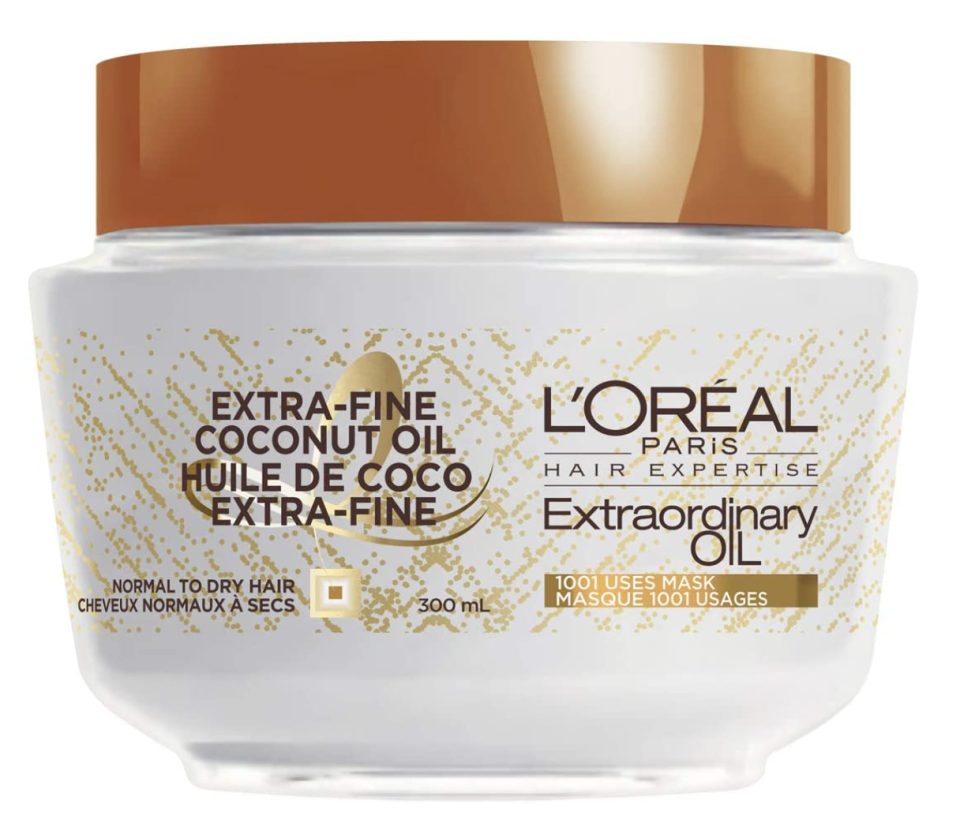 L'Oreal Paris Hair Expertise Extraordinary Oil 1001 Uses Hair Mask with Coconut Oil in white jar with brown lid (Photo via Amazon)