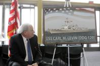 FILE - In this April 11, 2016 file photo, former U.S. Sen. Carl Levin watches during the unveiling of a photo of the USS Carl M. Levin during a ceremony in Detroit. Former Sen. Carl Levin, a powerful voice for the military during his career as Michigan’s longest-serving U.S. senator, has died. The Democrat was 87. Levin’s family says Levin died Thursday, July 29, 2021. (AP Photo/Carlos Osorio, File)