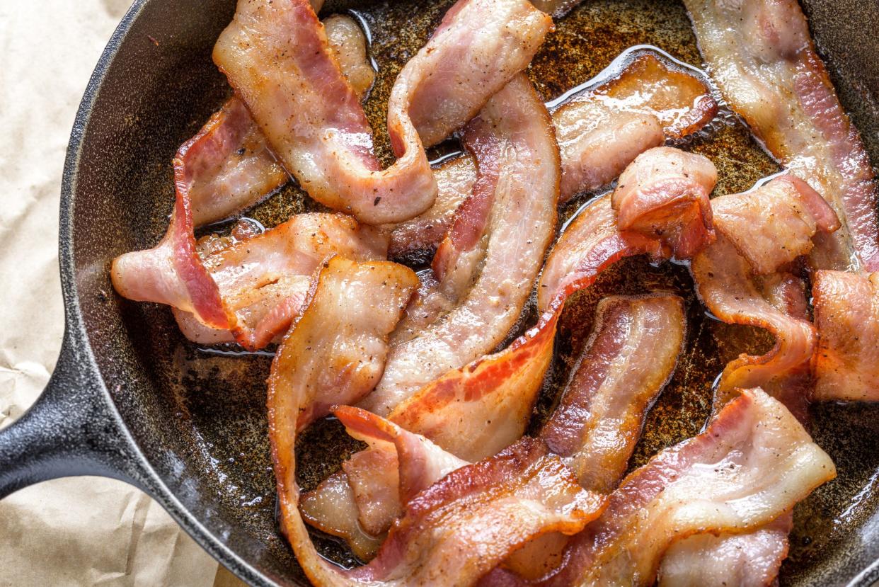 Bacon cooked in a cast iron pan