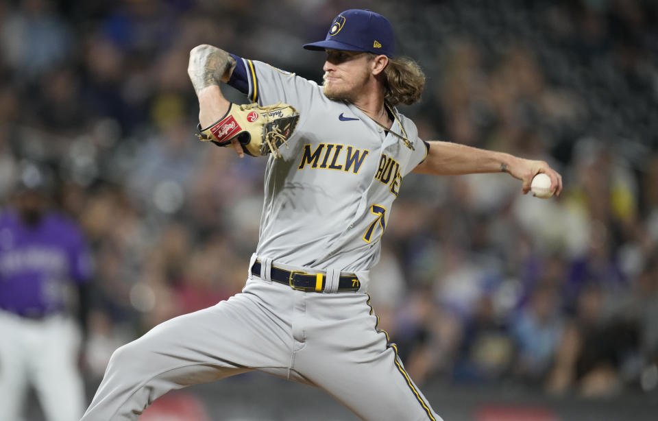 Milwaukee Brewers relief pitcher Josh Hader works against the Colorado Rockies during the ninth inning of a baseball game Saturday, June 19, 2021, in Denver. Milwaukee won 6-5. (AP Photo/David Zalubowski)