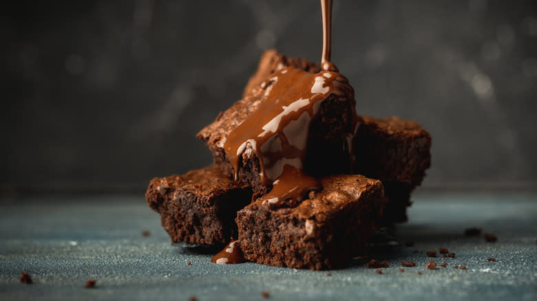 brownies with chocolate poured on top