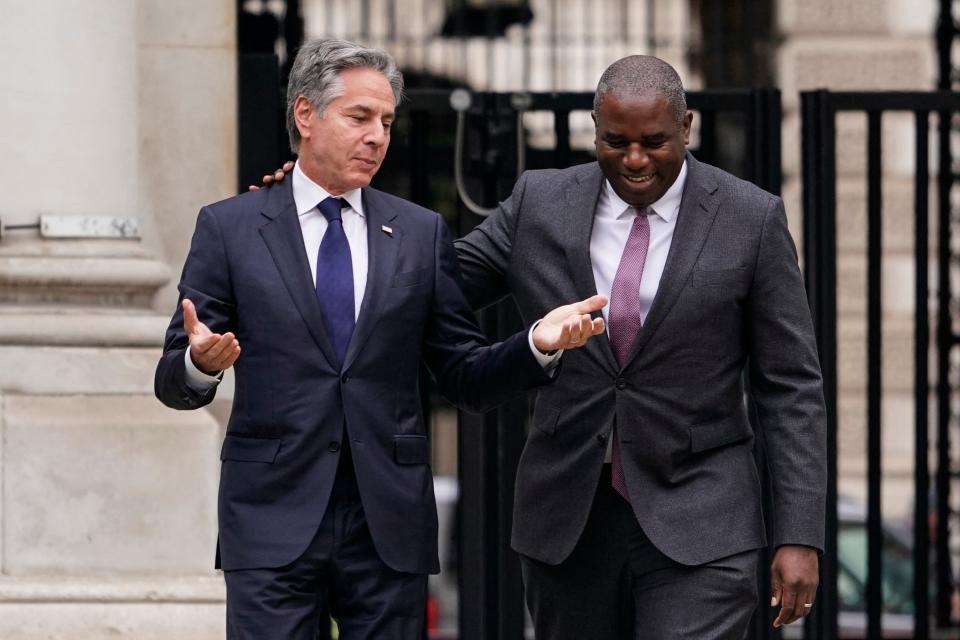 United States Secretary of State Antony Blinken (L) speaks with Britain's Foreign Secretary David Lammy (R) as he arrives at the Foreign, Commonwealth & Development Office (FCDO) in London (POOL/AFP via Getty Images)