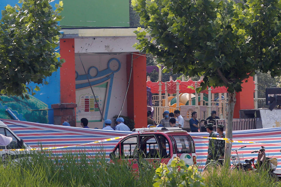 <p>Investigators work at the scene of an explosion inside a kindergarten in Fengxian County in Jiangsu Province, China , June 16, 2017. (Photo: Aly Song/Reuters) </p>