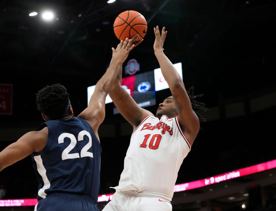 Feb. 23, 2023; Columbus, Ohio, USA; Ohio State Buckeyes forward Brice Sensabaugh (10) is guarded by Penn State Nittany Lions guard Jalen Pickett (22) during Thursday's basketball game at Value City Arena.Mandatory Credit: Barbara J. Perenic/Columbus Dispatch
