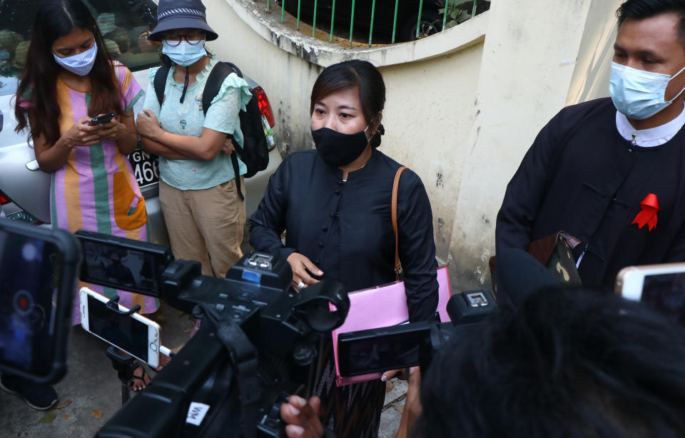 Tin Zar Oo, a lawyer representing the Associated Press journalist Thein Zaw, speaks to reporters outside the Kamayut court in Yangon, Myanmar Friday, Mar. 12, 2021. The court is scheduled to hold a hearing on Friday for Thein Zaw who was detained while covering demonstrations against the military's seizure of power last month. He is facing a charge that could send him to prison for three years. (AP Photo)