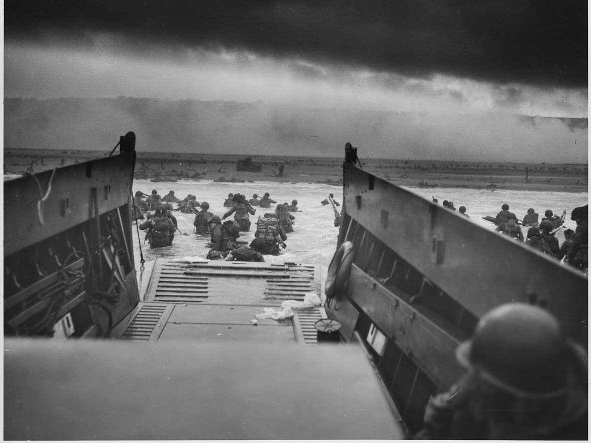 American soldiers land at Omaha Beach in Normandy, France, on the morning of June 6, 1944, the beginning of the long-awaited invasion to liberate continental Europe from the grip of Nazi Germany. (Franklin D. Roosevelt Library Public Domain Photographs, 1882 - 1962 - image credit)