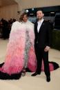 <p>Tennis player Williams wore a lace bodysuit and feathered cape by Gucci, while her husband Ohanian opted for a tux. </p>