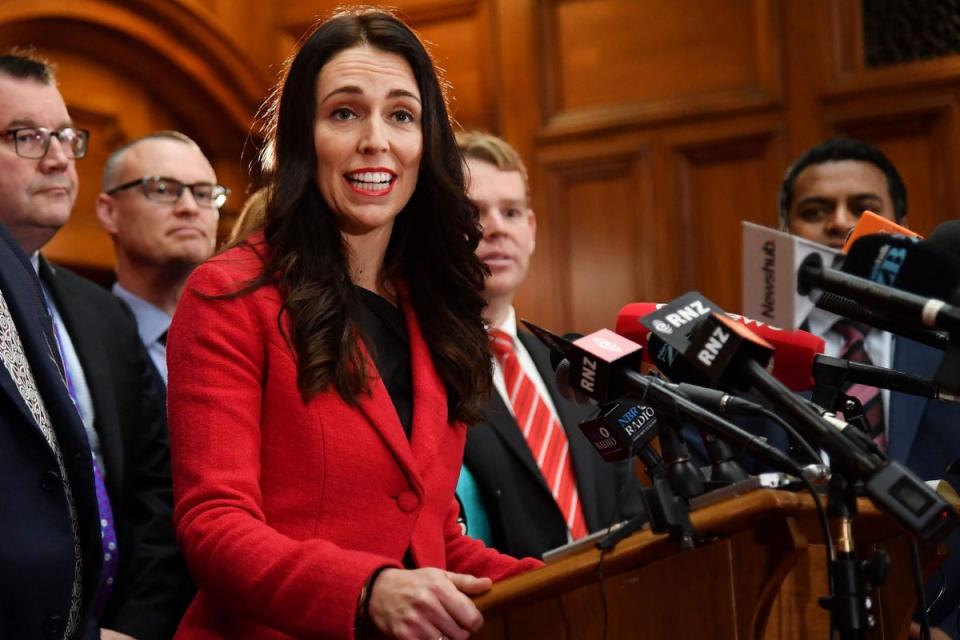 New leader of the Labour Party Jacinda Ardern speaks with her front bench at her first press conference at Parliament in Wellington on 1 August 2017 (AFP/Getty Images)