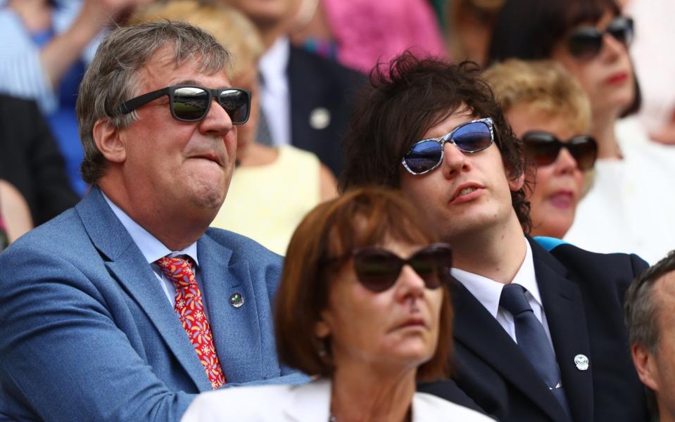 Stephen Fry and Elliott Spencer are regulars at Wimbledon - Credit: Michael Steele/Getty Images