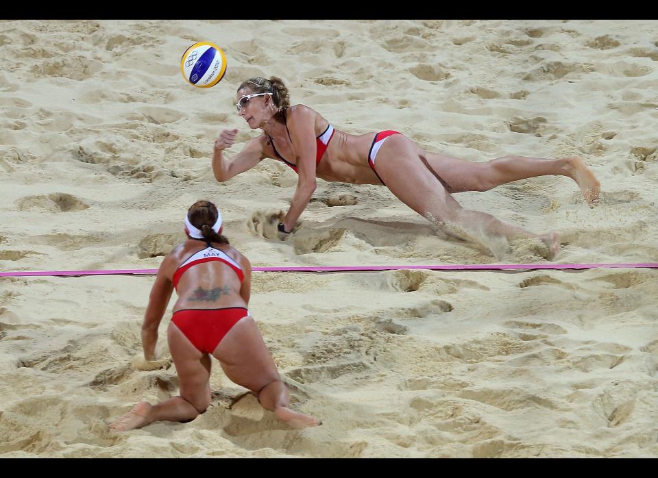 Kerri Walsh Jennings of the United States dives for the ball during the Women's Beach Volleyball Gold medal match against the United States on Day 12 of the London 2012 Olympic Games at the Horse Guard's Parade on August 8, 2012 in London, England. 