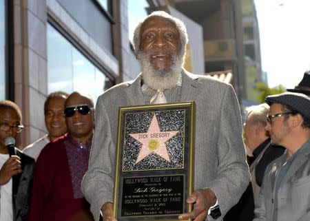 Comedian Dick Gregory receives his star on Star on the Hollywood Walk of Fame in Los Angeles, California February 2, 2015. REUTERS/Gus Ruelas/files