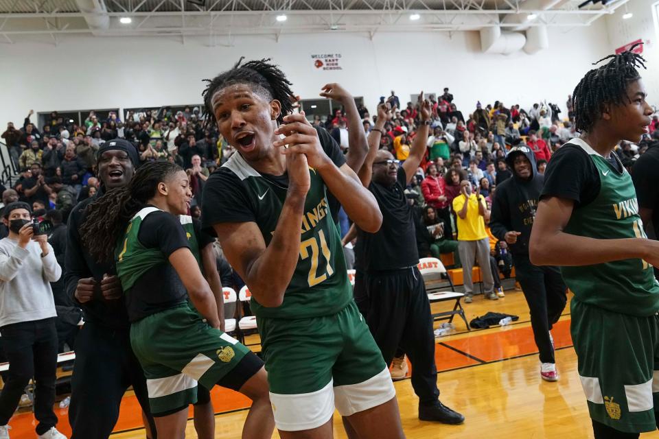 Nehemiah McMorris celebrates Northand's 63-46 win over South in the City League championship game Saturday at East.