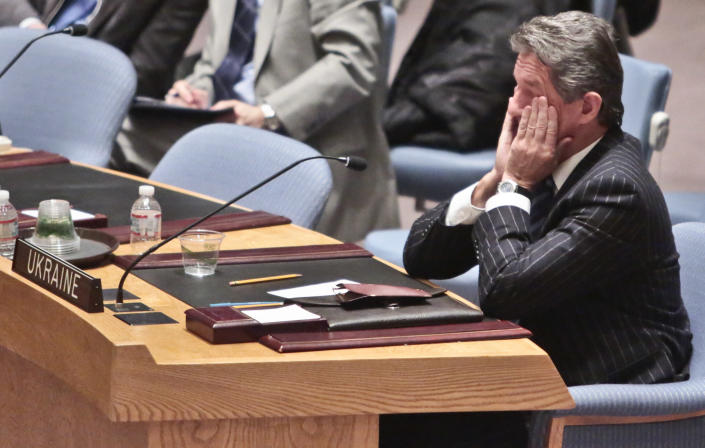 U.N. Ukraine Ambassador Yuriy Sergeyev listens during a U.N. Security Council meeting on Ukraine, Monday, March 3, 2014 at U.N. headquarters. (AP Photo/Bebeto Matthews)