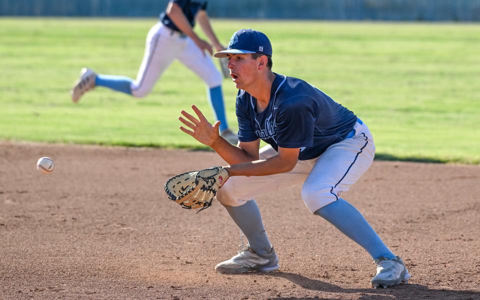 Central Valley Christian's Case Anker fields a hit ball against Exeter in a Tri-County Conference Sequoia Division game on Wednesday, May 10, 2023. 