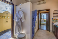 <p>This one has an indoor and outdoor shower. (Airbnb) </p>