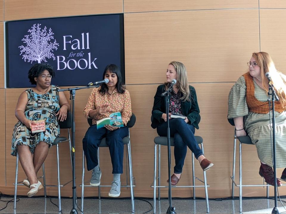 Author Jyotsna Sreenivasan, second from left, reads from "These Americans" during the "Fall for the Book" festival in Virginia.