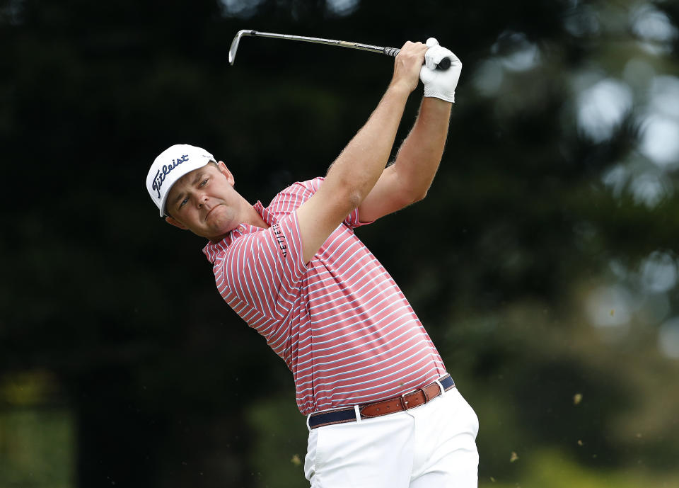 Patton Kizzire plays his shot from the second tee during the third round of the Tournament of Champions golf event, Saturday, Jan. 5, 2019, at Kapalua Plantation Course in Kapalua, Hawaii. (AP Photo/Matt York)