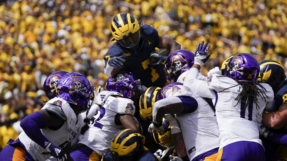 Michigan running back Donovan Edwards (7) is stopped by East Carolina at the goal line in the second half of an NCAA college football game in Ann Arbor, Mich., Saturday, Sept. 2, 2023. (AP Photo/Paul Sancya)