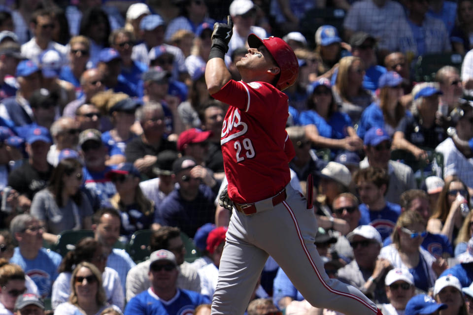 Cincinnati Reds' TJ Friedl celebrates as he rounds the bases after hitting a three-run home run during the second inning of a baseball game against the Chicago Cubs in Chicago, Sunday, June 2, 2024. (AP Photo/Nam Y. Huh)