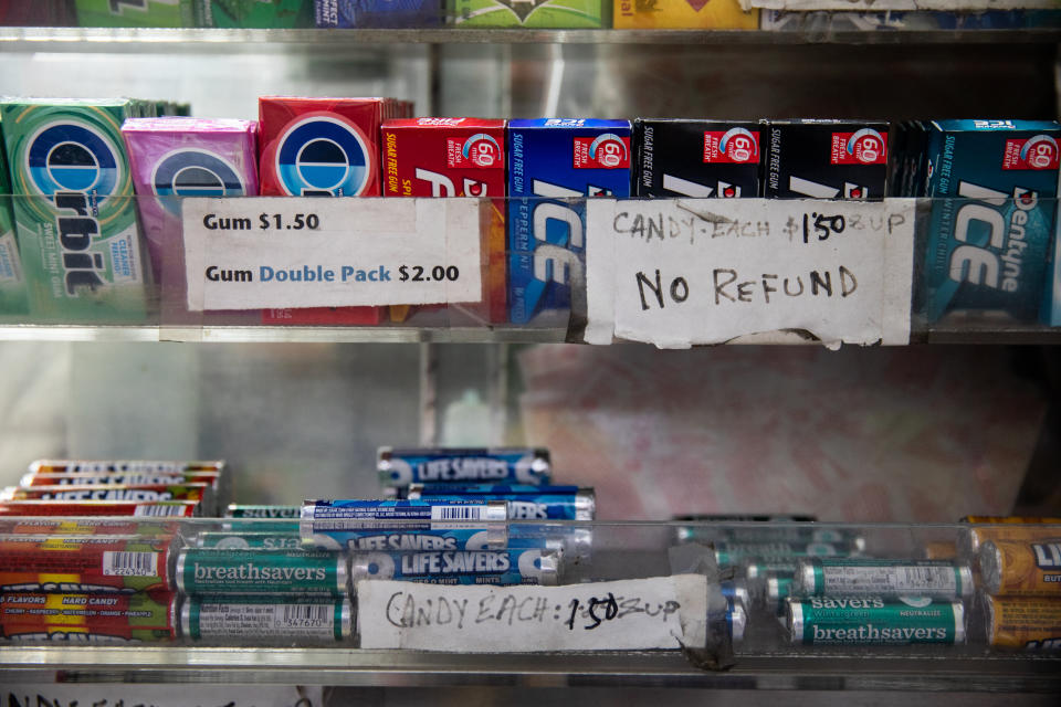 Prices and a notice about the refund policy adorn Abul Kalam Azad's newsstand near New York Criminal Court on April 4, 2023. (Julius Constantine Motal / NBC News)