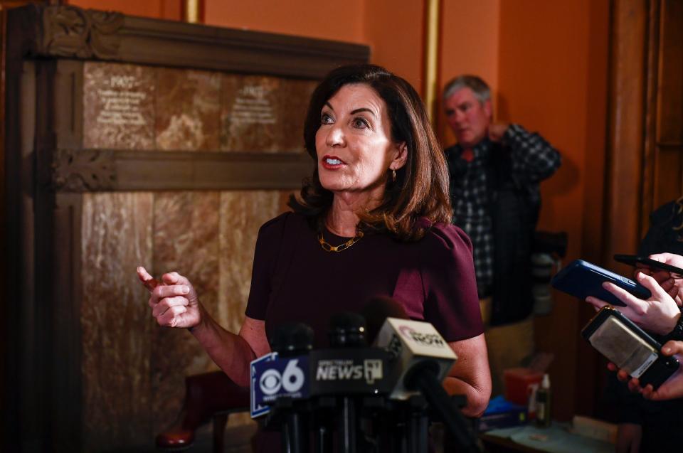 New York Gov. Kathy Hochul talks with reporters about the state budget at the state Capitol, Monday, April 4, 2022, in Albany, N.Y.
